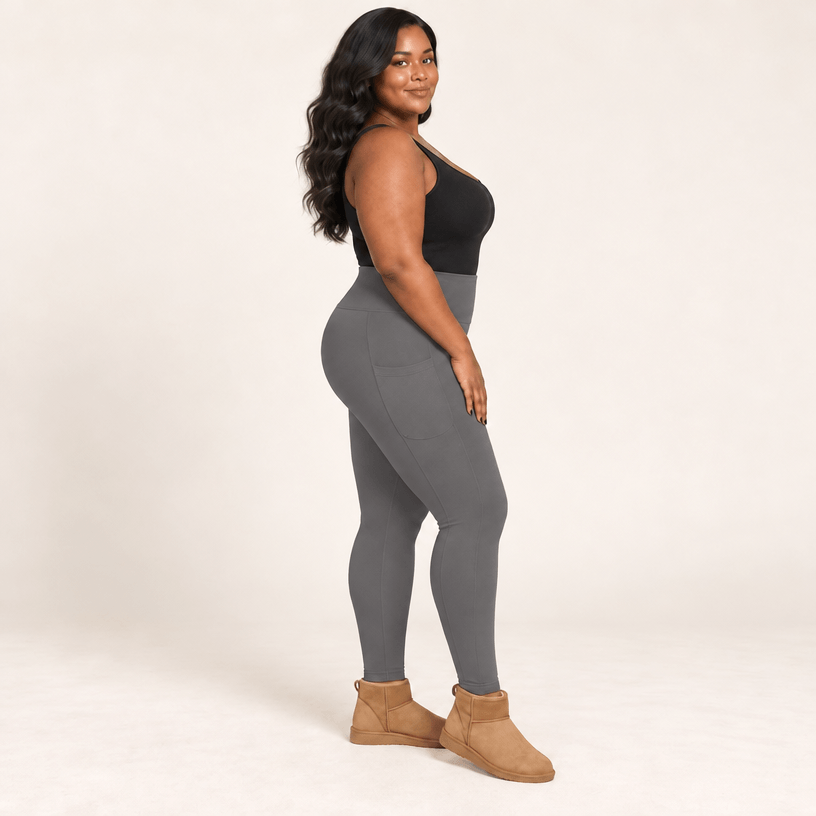 Collant polaire grande taille gris vu de profil, poche latérale visible