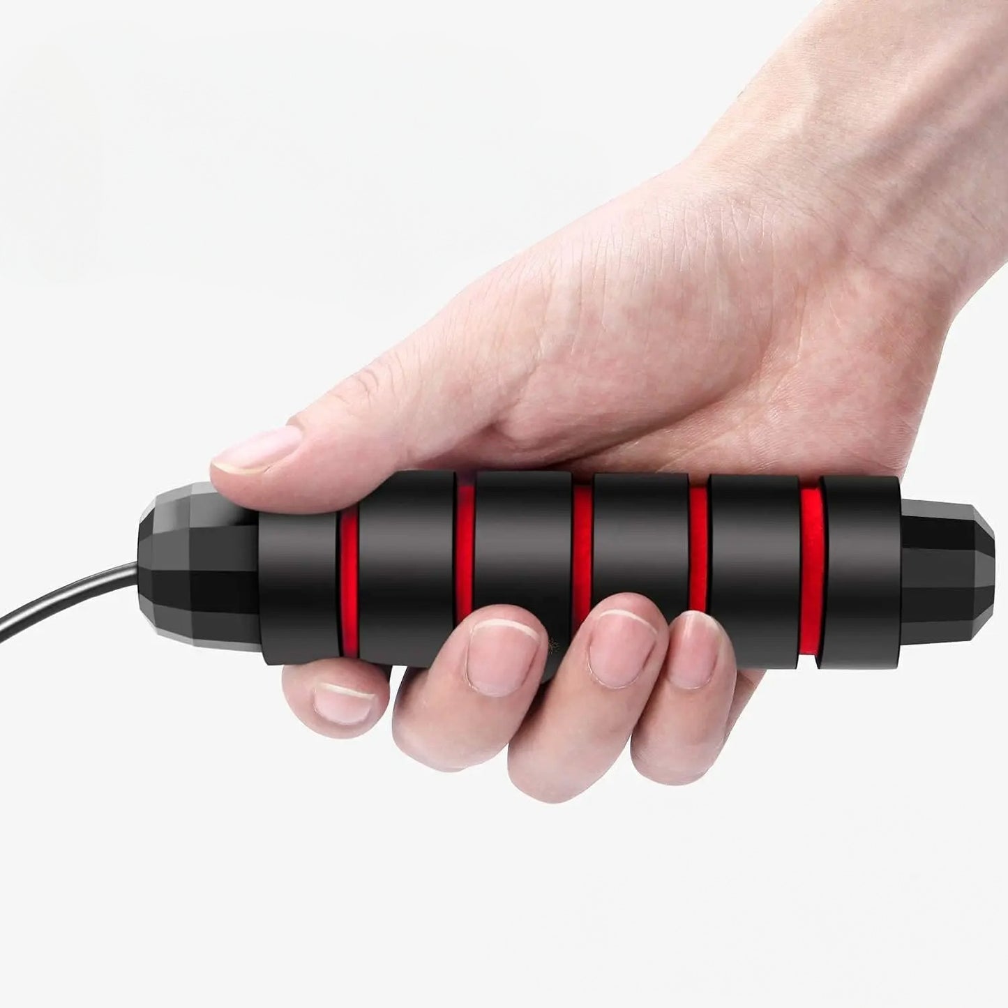 Gros plan poignées ergonomiques corde a sauter mousse mémoire forme antidérapante