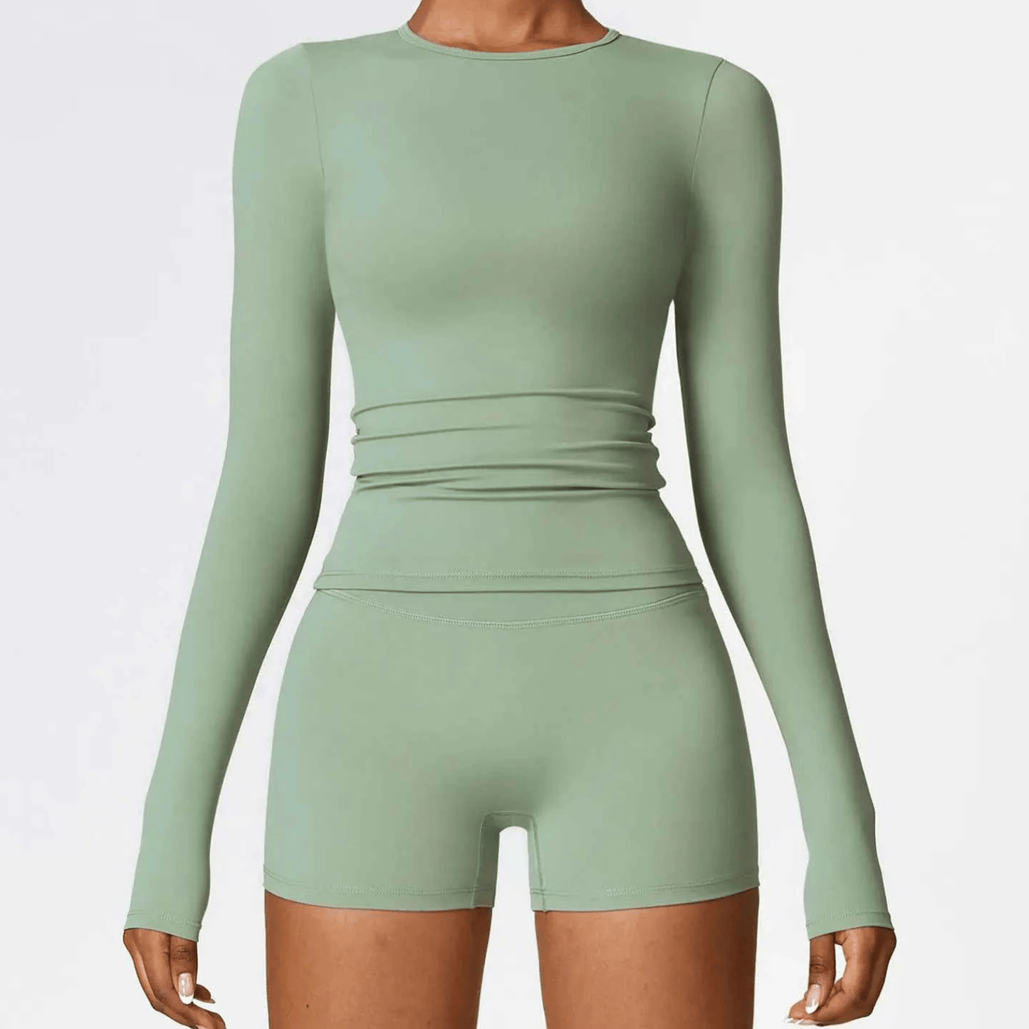 Haut de sport compressif femme manches longues seconde peau, parfait pour yoga dynamique et pilates