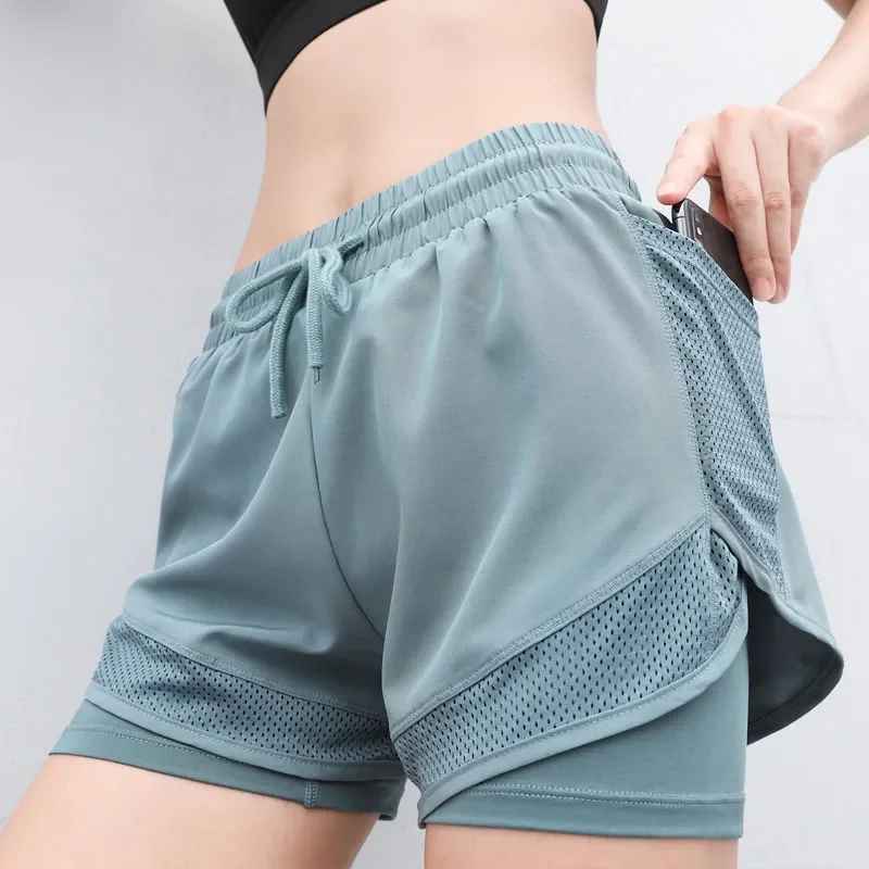 Runneuse short running femme, jogging matinal poche smartphone sécurisée
