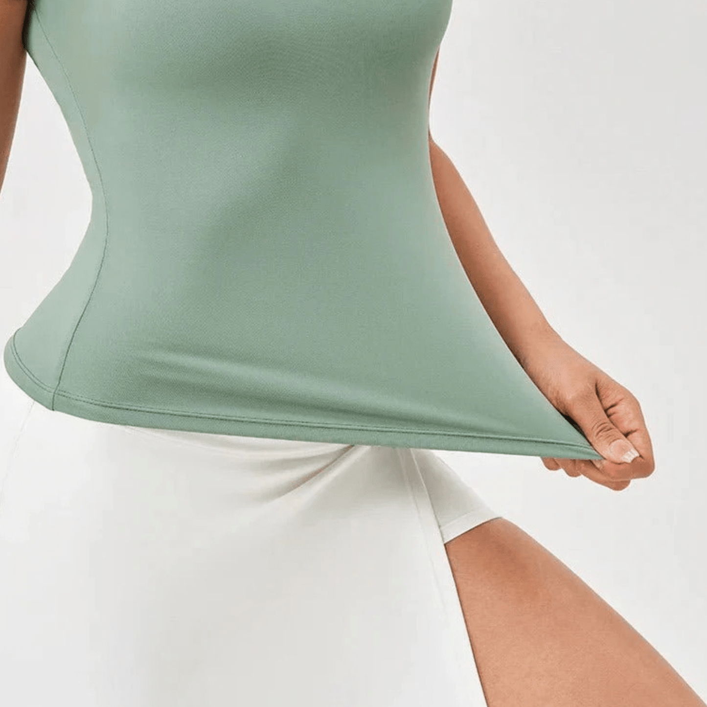 haut sport femme noir coupe sculptante biomécanique élasticité 4D