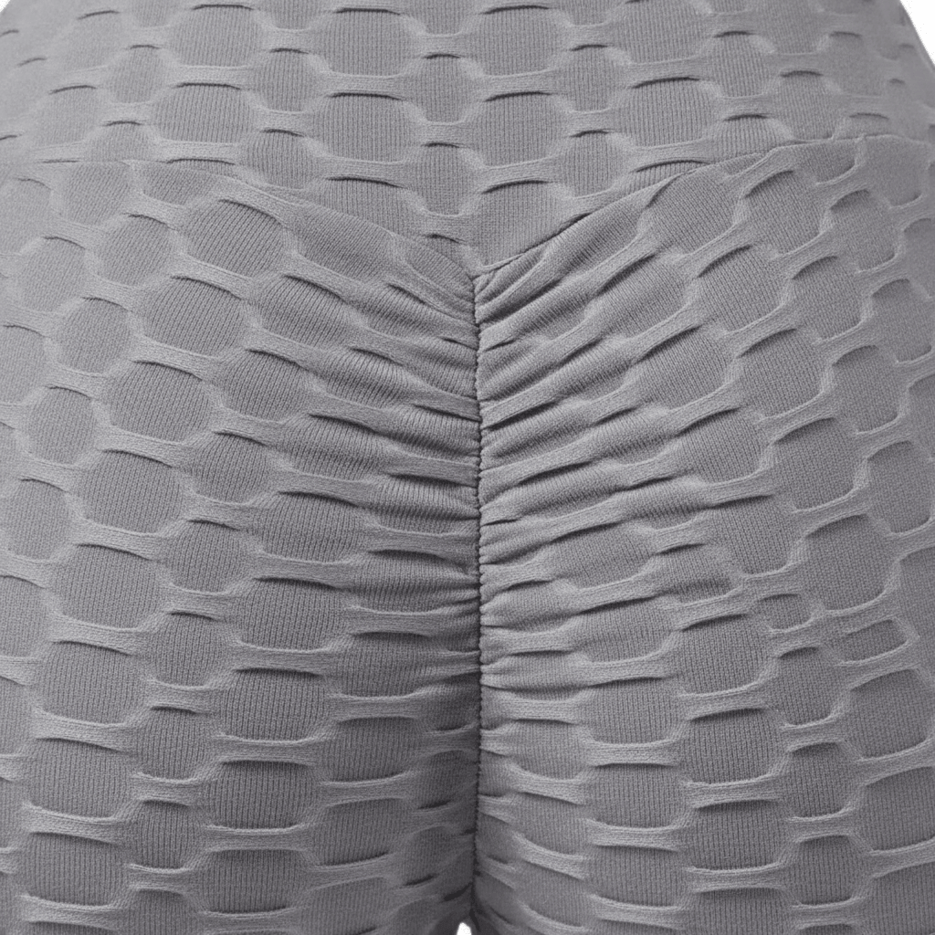 Short Anti-Cellulite Nid d'Abeille Taille Haute gris clair, zoom sur la matière nid d’abeille (texture 3D honeycomb) et les détails du tissu, photo studio haute définition.