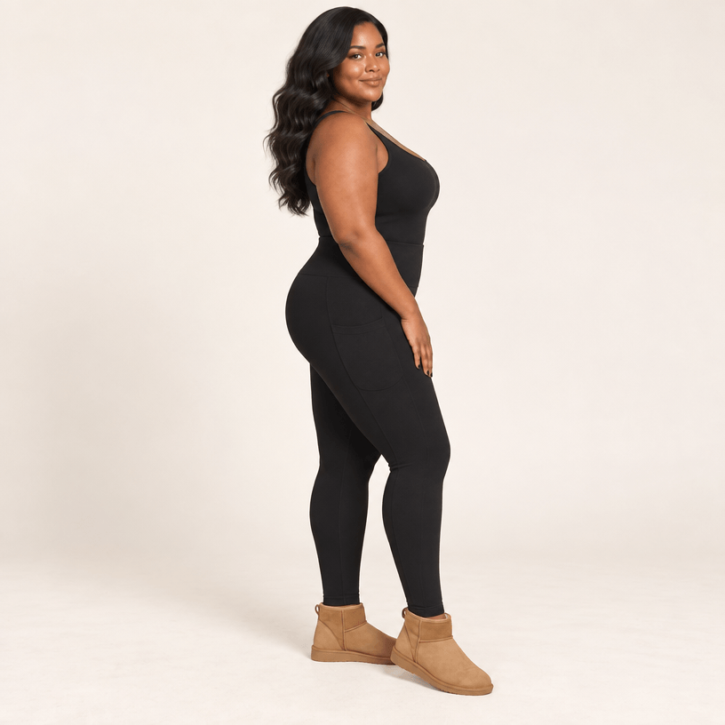 Collant polaire grande taille noir vu de profil, poche latérale et ceinture haute