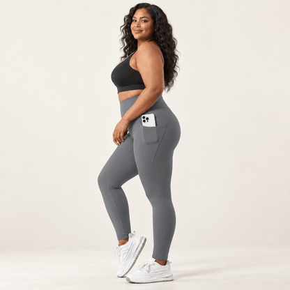 Legging randonnée femme grande taille gris de profil, poche latérale profonde