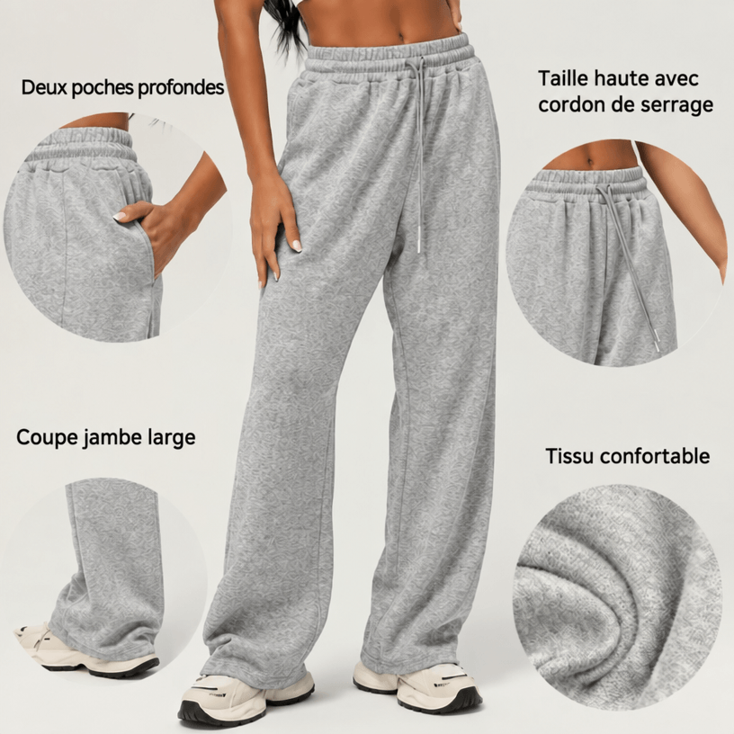 Détails du jogging femme gris : deux poches profondes, taille haute avec cordon de serrage, coupe jambe large et maille confortable