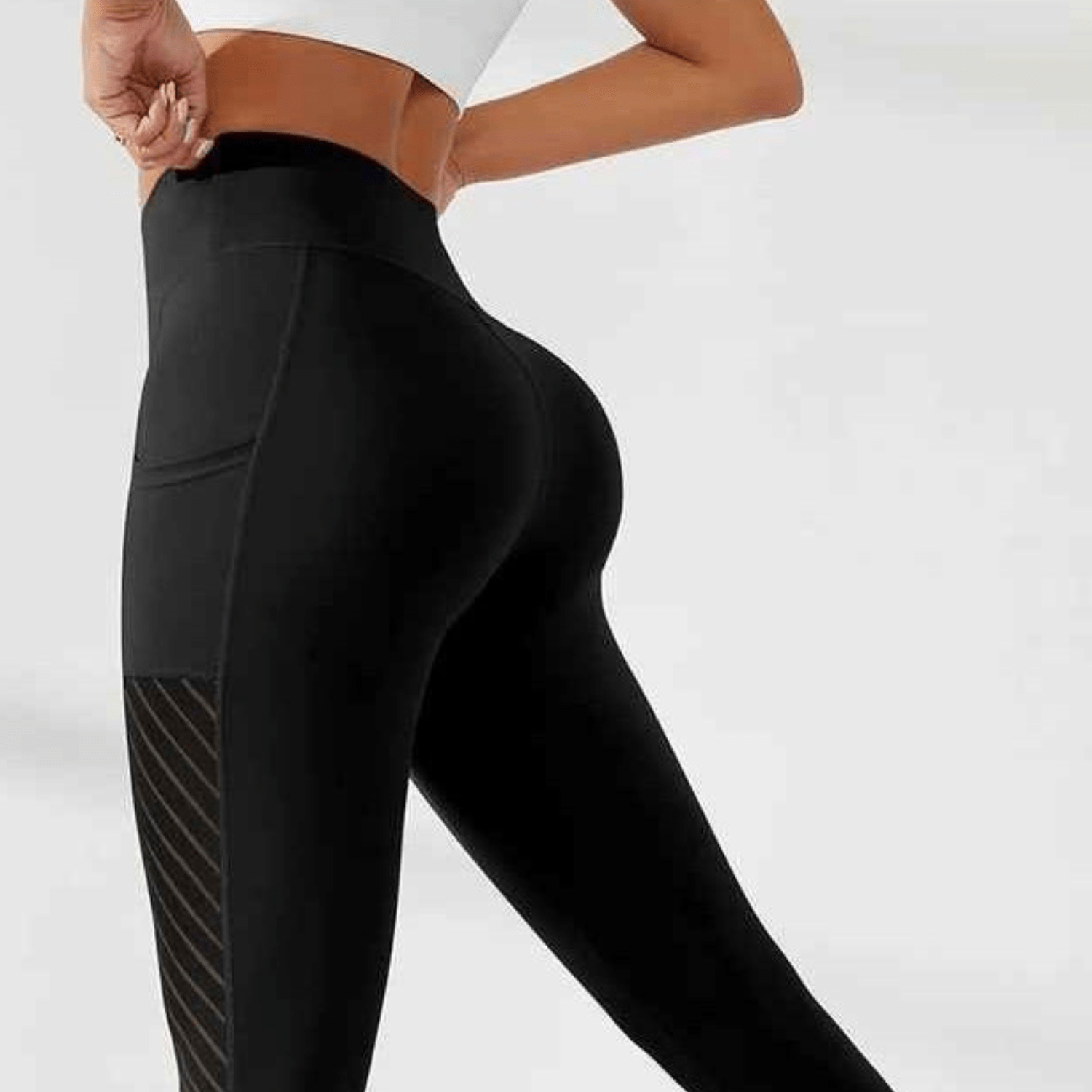 Ceinture taille haute large et sculptante du legging capri running offrant maintien abdominal sans compression respiratoire