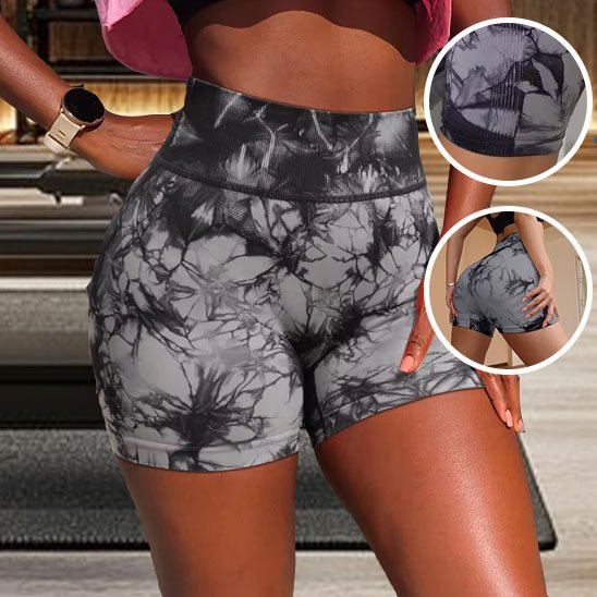 Détail shorts sport femme tie-dye plissés, effet sculptant et gainant pour silhouette harmonieuse