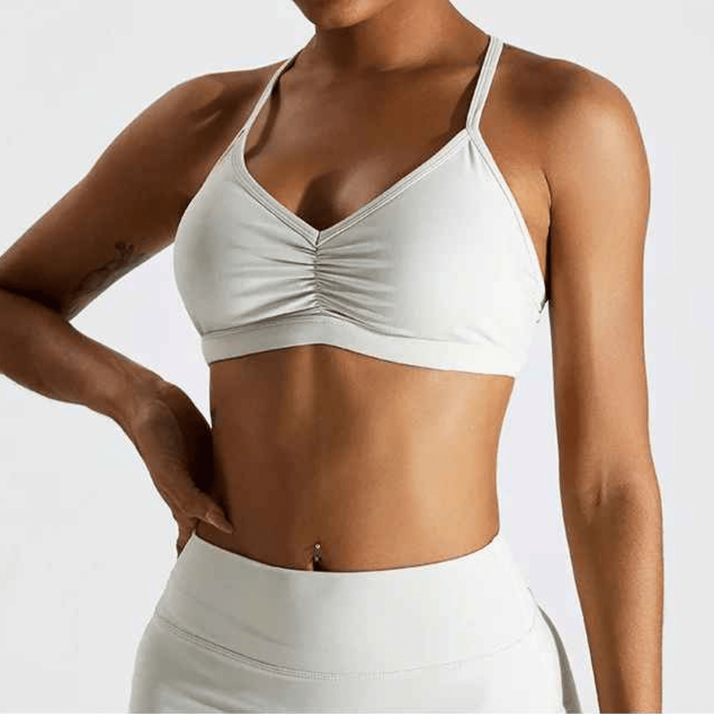 Détail brassiére sport dos croisé design révolutionnaire maintien technique