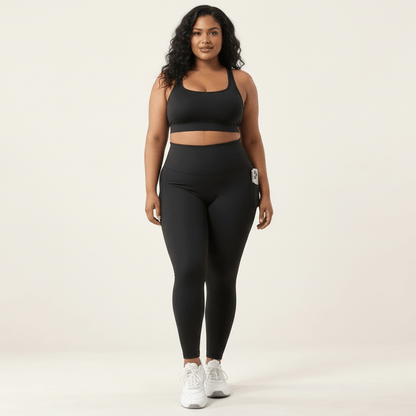 Legging randonnée femme grande taille noir vu de face, taille haute et poches latérales
