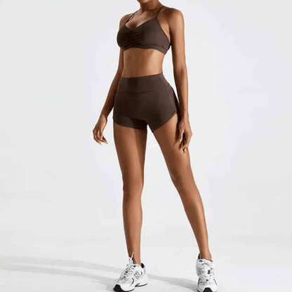 Femme portant brassiére sport dos croisé composition technique 78% nylon 22% spandex