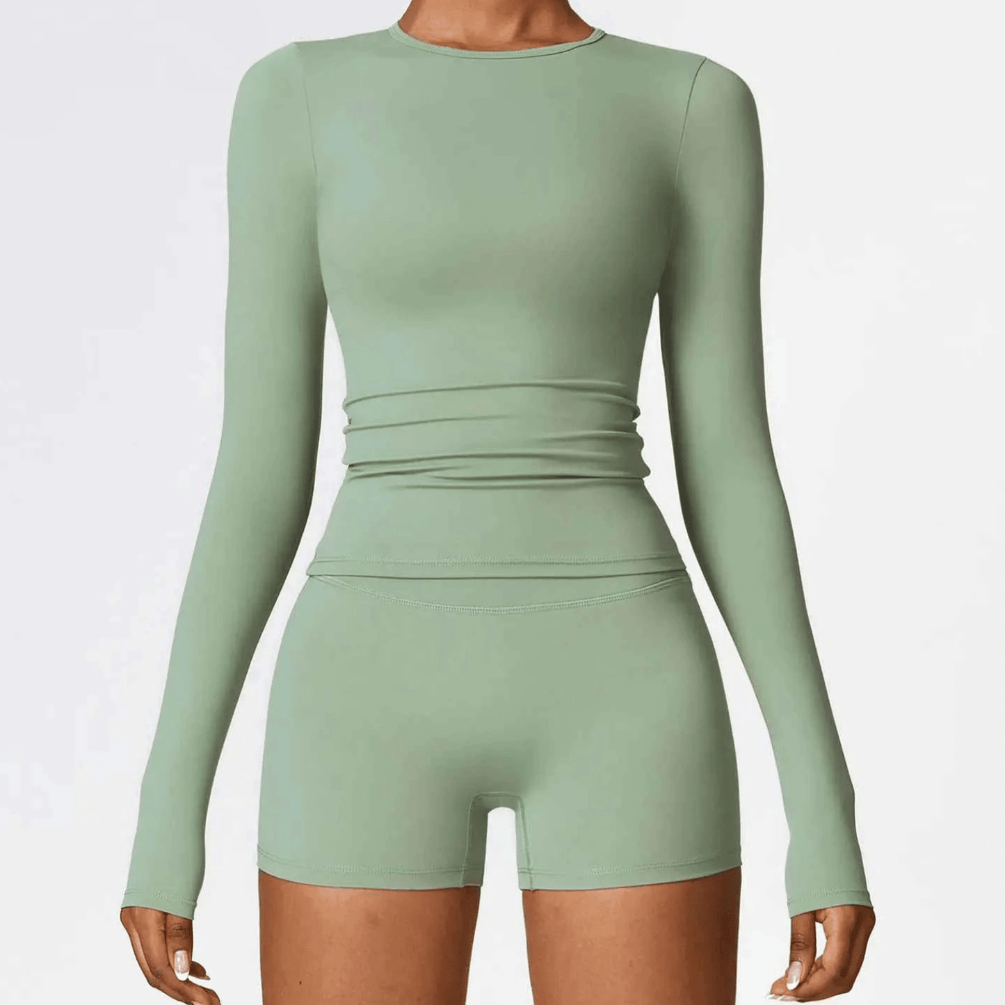 Haut de sport compressif femme manches longues seconde peau, parfait pour yoga dynamique et pilates