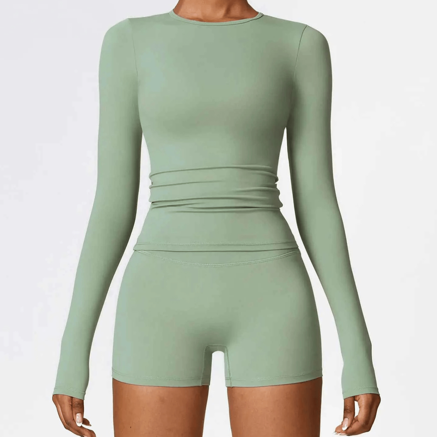 Haut de sport compressif femme manches longues seconde peau, parfait pour yoga dynamique et pilates