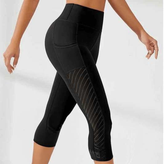 Legging running femme capri noir taille haute avec poches intégrées pour smartphone, longueur trois-quarts sous le mollet