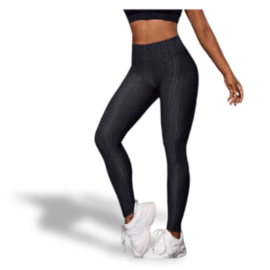 Mannequin portant le legging anti-cellulite noir effet push-up et gainant de Positiflow sur fond blanc
