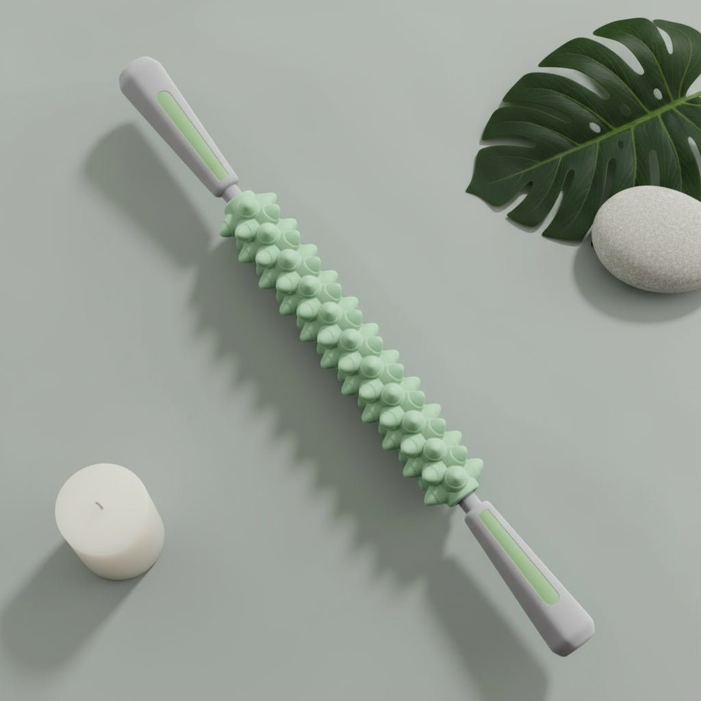 Rouleau de massage POSITIFLOW vert avec picots ergonomiques pour récupération musculaire