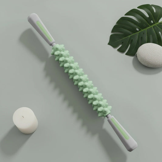 Rouleau de massage POSITIFLOW vert avec picots ergonomiques pour récupération musculaire