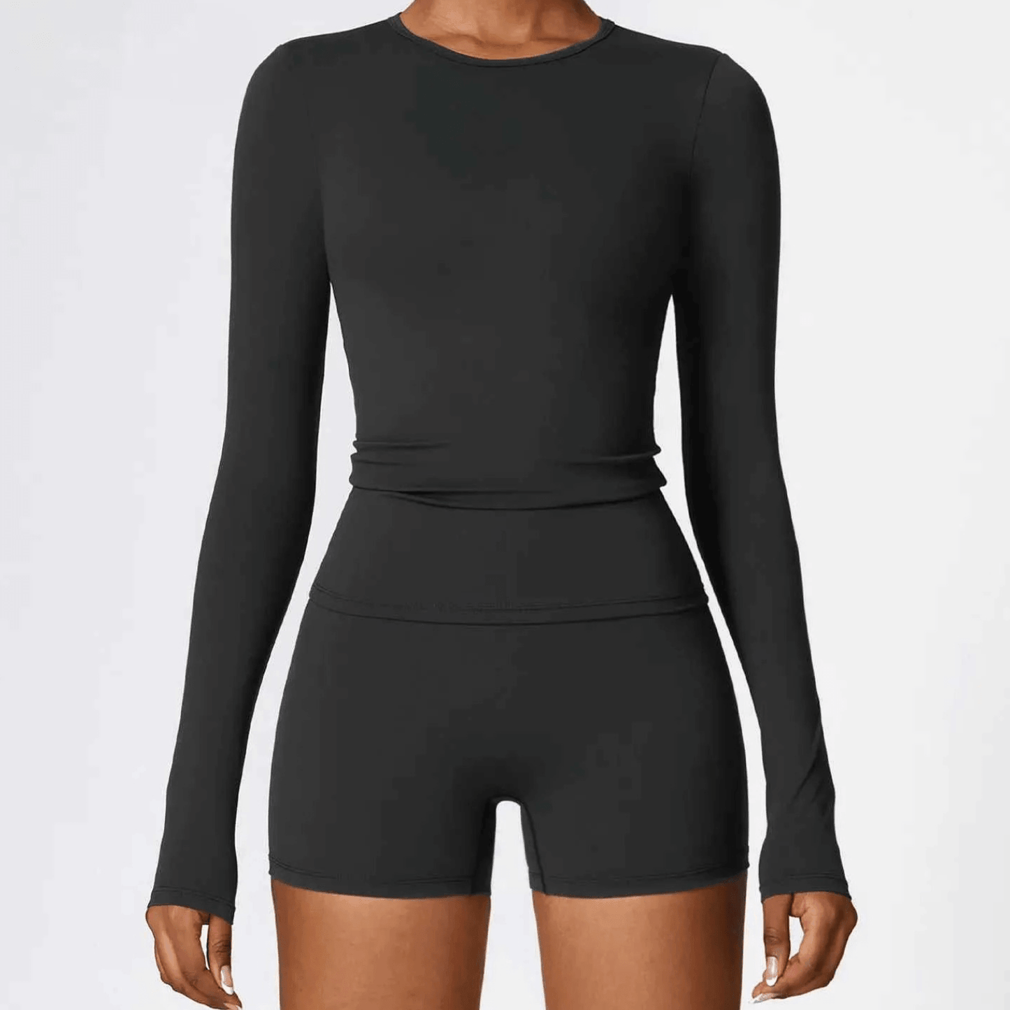 T-shirt compressif femme respirant, manches longues ajustées pour running et entraînement intensif