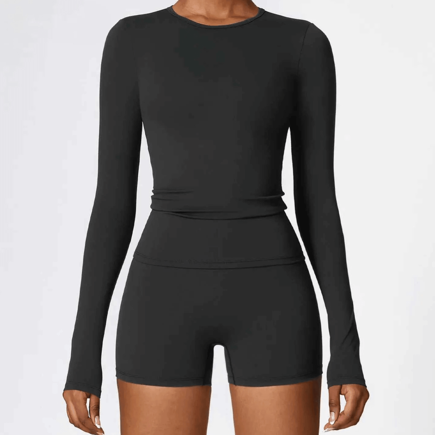 T-shirt compressif femme respirant, manches longues ajustées pour running et entraînement intensif