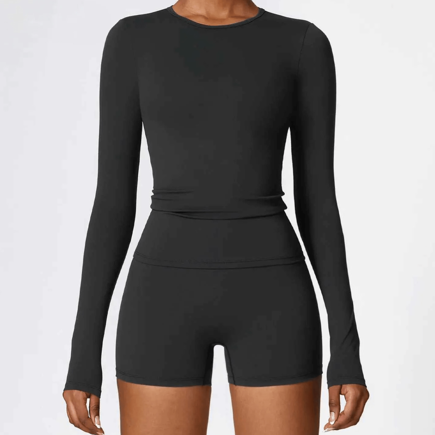 T-shirt compressif femme respirant, manches longues ajustées pour running et entraînement intensif