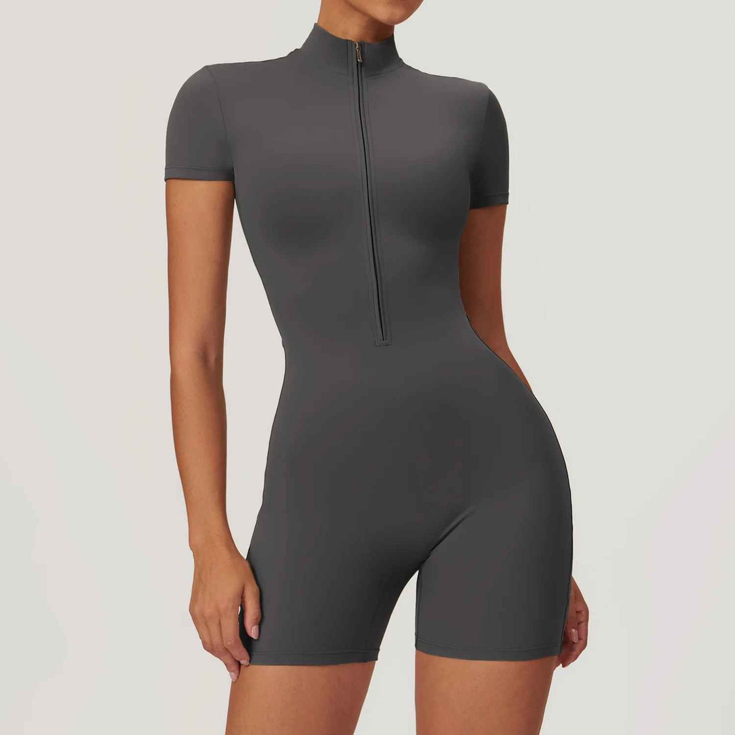 Tenue sport polyvalente fermeture zip bodysuit fitness gris