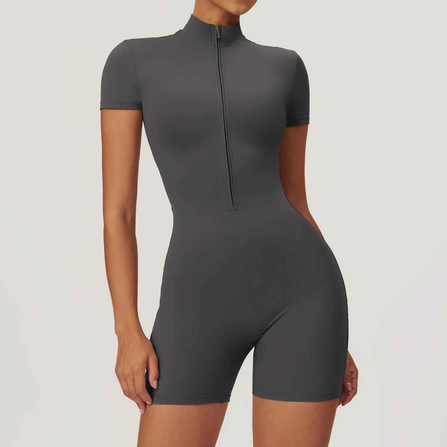 Tenue sport polyvalente fermeture zip bodysuit fitness gris