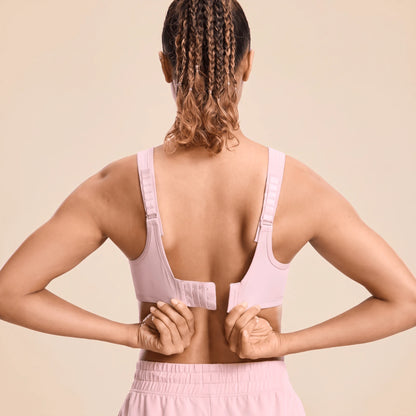 Dos d'une brassière fitness rose avec fermeture à crochets à 4 colonnes et 3 rangées