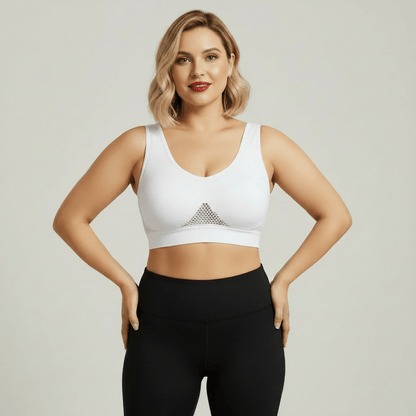 Brassière sport femme blanche avec mesh triangulaire devant – vue face studio
