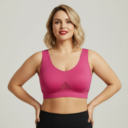 Brassière sport femme rose fuchsia avec mesh triangulaire devant – vue face studio