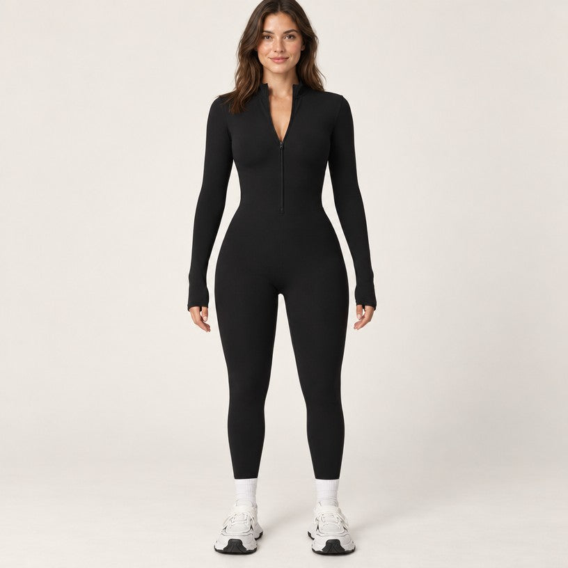 Combinaison polaire femme noire vue de face, col montant zippé et manches à trous pouces