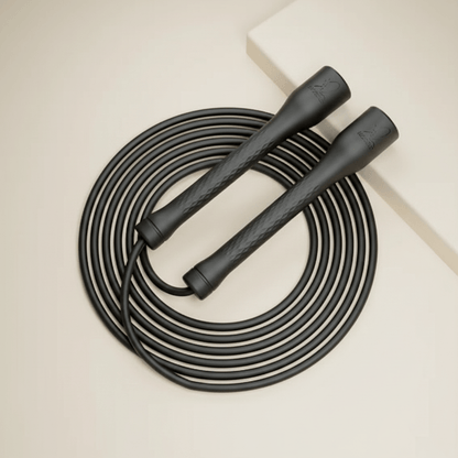 Corde à sauter enfant noire réglable enroulée, vue produit