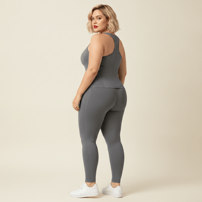 Débardeur femme grande taille gris dos nageur en H seamless maille respirante vue dos trois-quarts fond studio crème