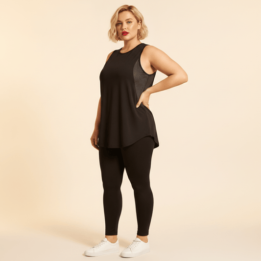 Débardeur grande taille femme noir empiècements mesh respirant coupe ample longue vue de face fond studio crème