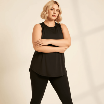 Débardeur grande taille femme noir mesh respirant torsion douce pose échauffement fond studio crème