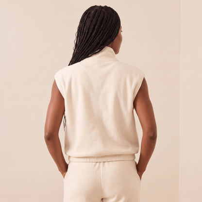 Gilet polaire sans manche femme blanc crème vu de dos, col montant et ourlet à cordon