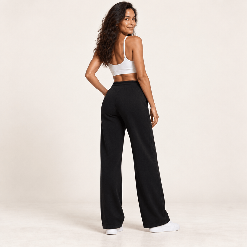 Jogging polaire femme noir vu de dos, taille haute et tombé droit