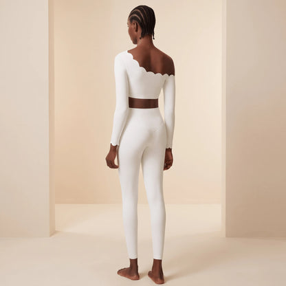 Legging blanc long femme vu de dos en pied : ceinture haute, silhouette allongée et longueur cheville