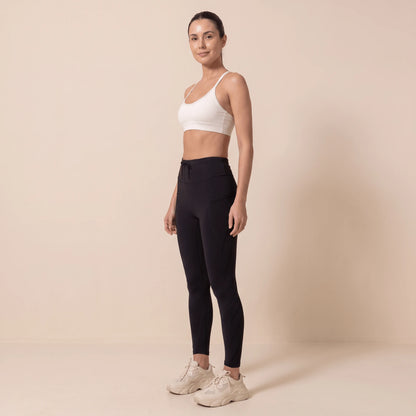 Legging compression sport femme noir taille haute à cordon, vue de trois quarts