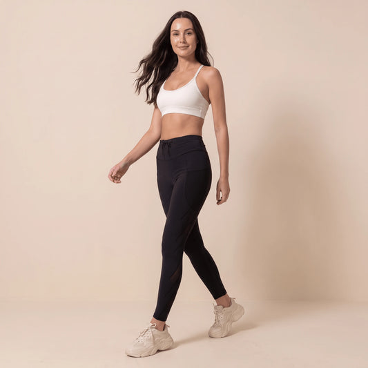 Legging de compression sport femme noir taille haute, en marchant, poches latérales et cordon