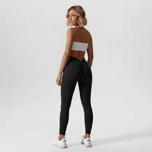 Leggings noir scrunch dos, vue de dos face caméra, technologie compression
