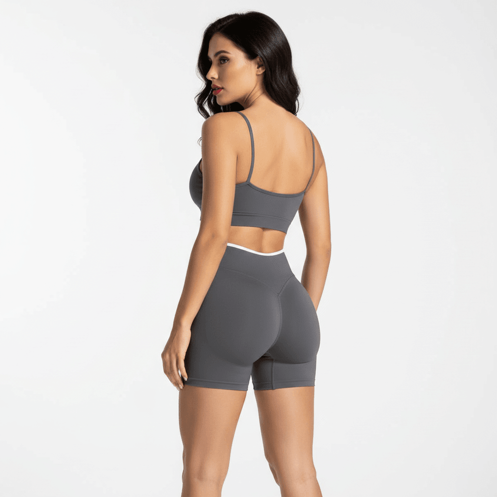 Sport short femme gris foncé vue de dos, taille haute, matière lisse, ceinture blanche