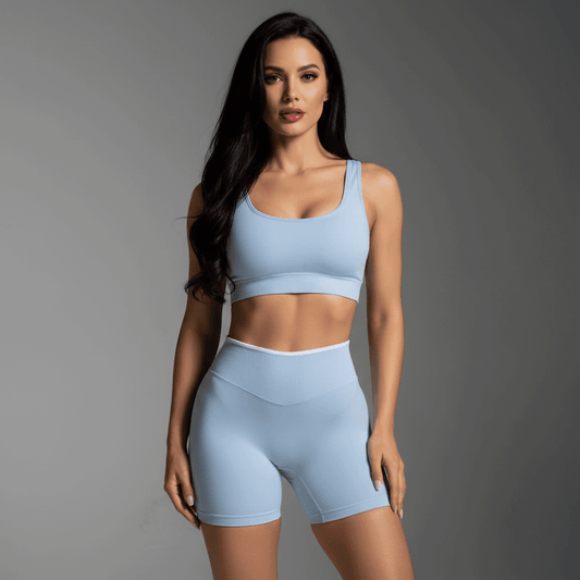 Sport short femme noir vue de face, taille haute, coupe gainante, ceinture blanche