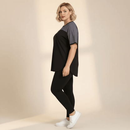 Tee shirt grande taille femme noir mesh gris color-block coupe fluide vue de profil fond studio crème