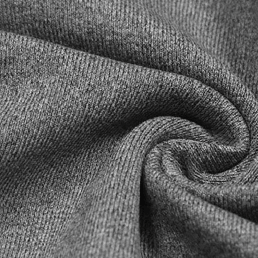 Top manches longues croisé femme gris chiné – zoom macro tissu seamless knit, texture premium stretch, fond studio ivoire